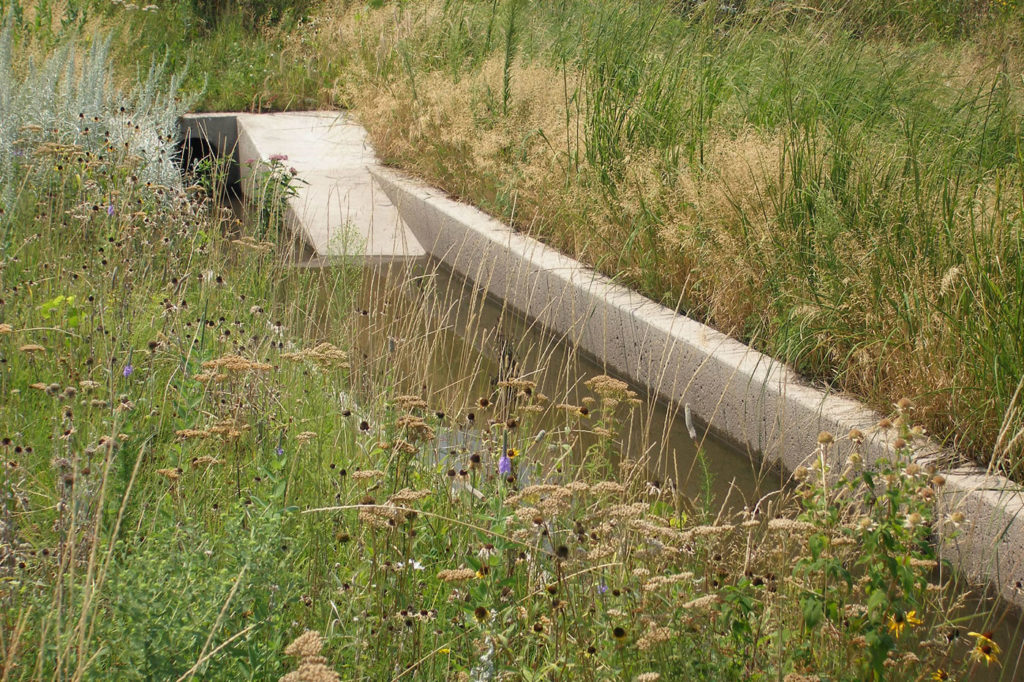 A close-up view of a trench forebay, which cleans stormwater by removing sediment.