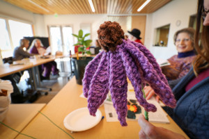 A crocheted flower made by a Putting Down Roots contributor.