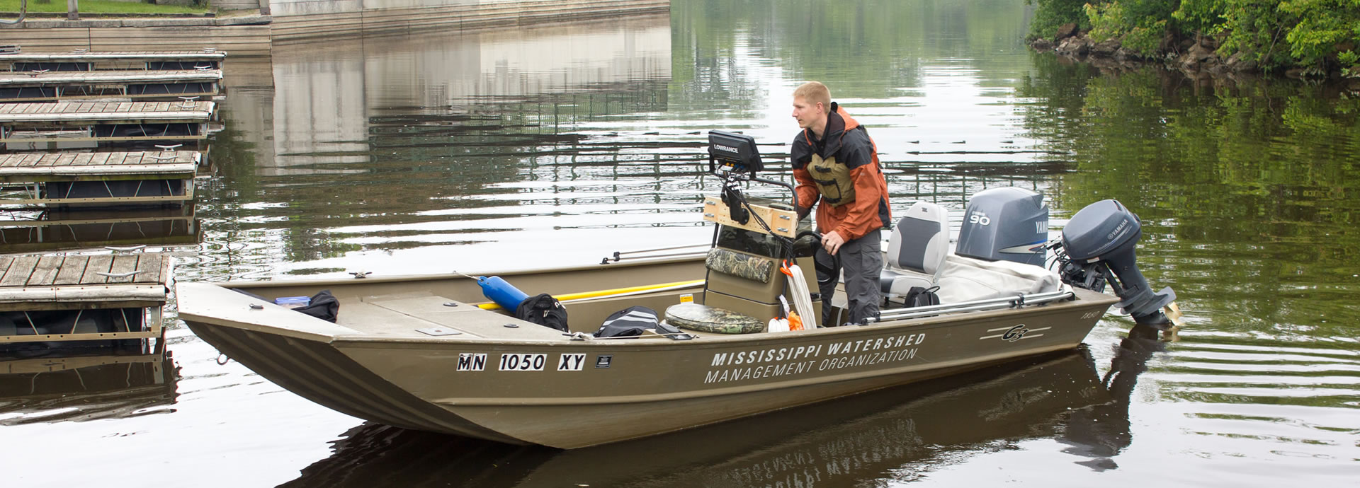 An MWMO monitoring team member docking the MWMO boat.