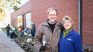A pair of Mini Grant recipients at a raingarden planting event in 2015.
