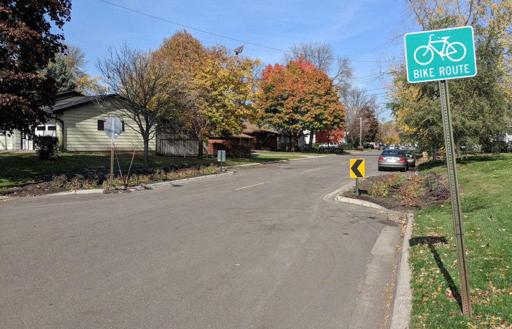 Street with planted bumpouts.