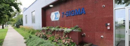 The building entrance at 7-SIGMA.