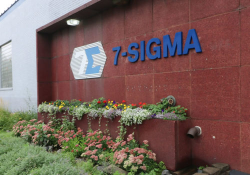 The building entrance at 7-SIGMA.