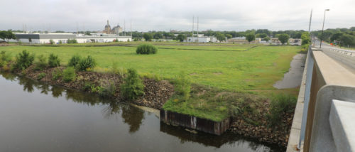 The future location of Scherer Park, as viewed from the Plymouth Avenue Bridge in August 2016.
