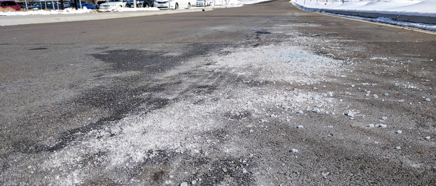 Road salt on dry pavement.