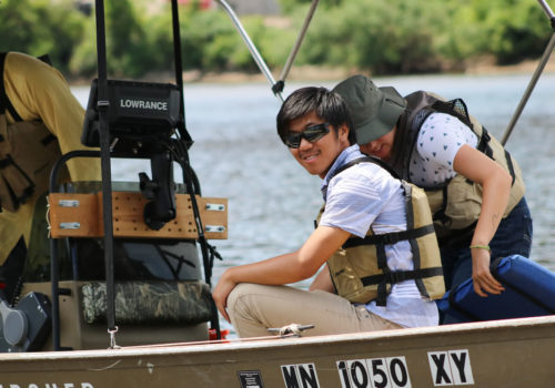Green Team Alumni Intern, Yengsoua Lee, out on the boat with the MWMO monitoring team.