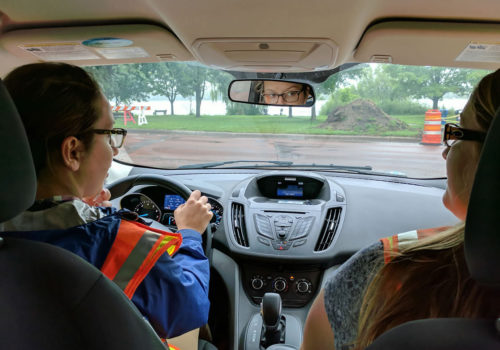 City of Minneapolis erosion monitoring interns driving to a construction site.