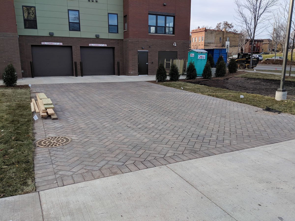 A permeable paver driveway at EcoVillage Apartments.