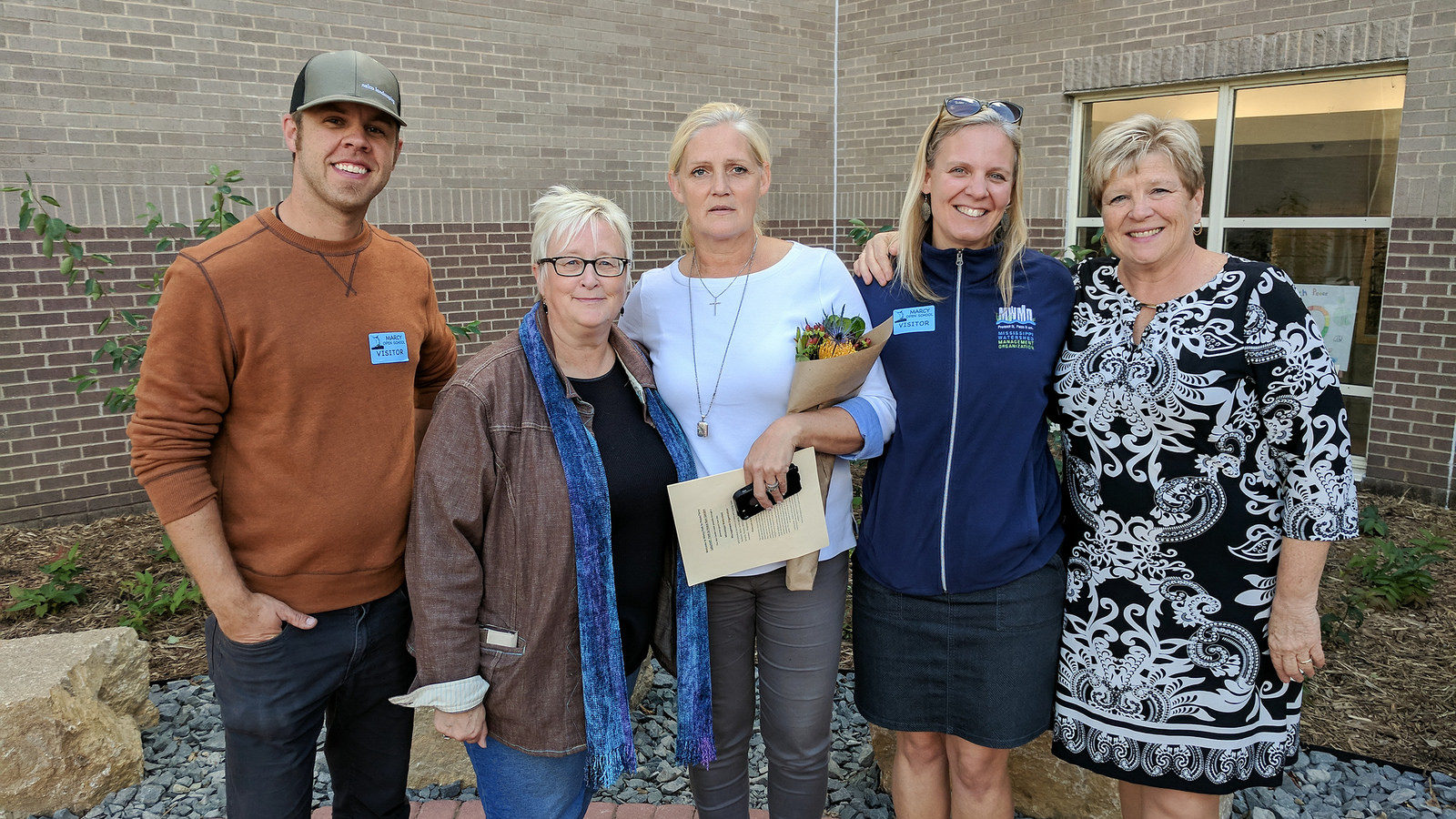 From left: Brian Nelson of Nelco Landscaping, Marcy Open School parent alumna Catherine Conzet, parent council member Jacqueline Dekker Travis, MWMO Professional Training and Development Specialist Abby Moore, and Principal Donna Andrews.