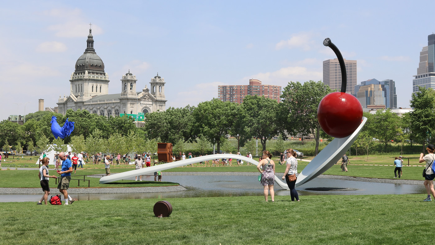 Visitors surround the Spoonbridge and Cherry sculpture at the Minneapolis Sculpture Garden.