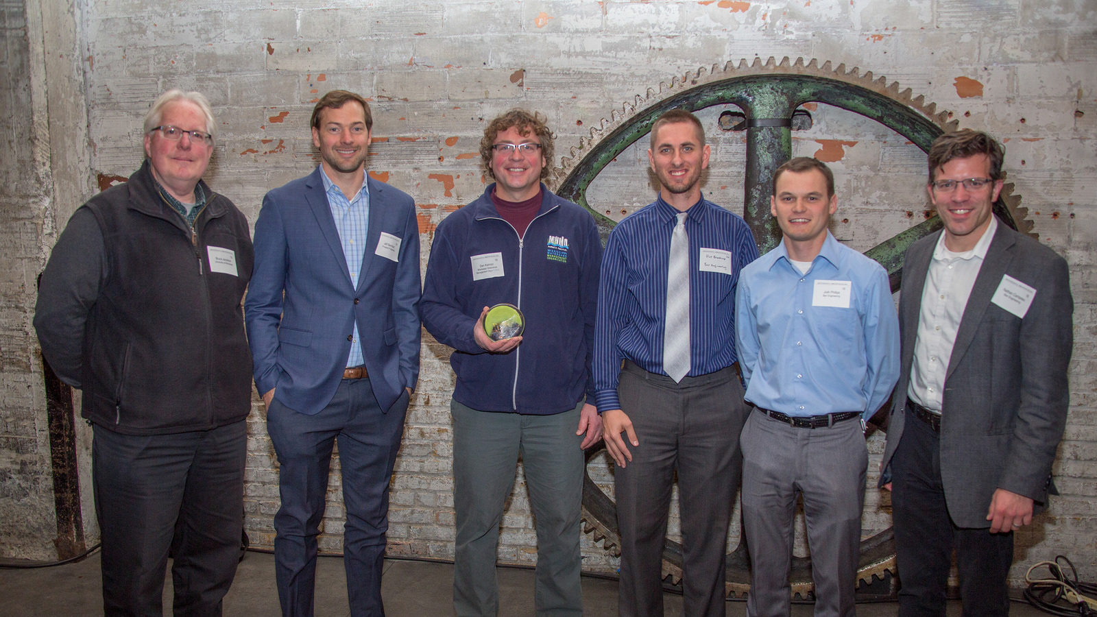 From left: Landscape architect Bruce Jacobson, Jeff Barnhart of Prospect Park Properties, MWMO Planning Principal Dan Kalmon, and Patrick Brockamp, Josh Phillips and Nathan Campeau of Barr Engineering.