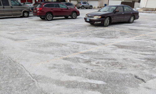 A parking lot caked with salt.