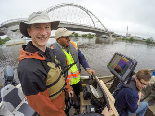 Staff conducting bathymetric mapping near the Lowry Avenue Bridge in June 2015.