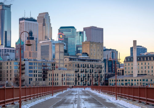 The downtown Minneapolis skyline, as seen from the Stone Arch Bridge. (Credit: Nick Busse)