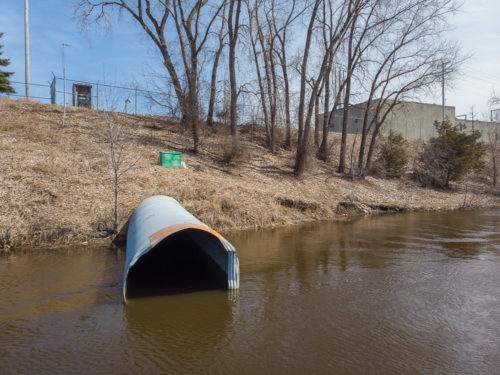 Mississippi River water enters a stormwater outfall in Northeast Minneapolis.