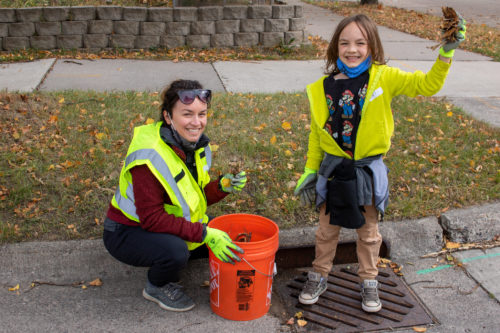 Both kids and adults help in keeping drains clean.