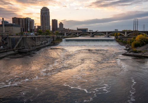 The Mississippi River and St. Anthony Falls at sunset.