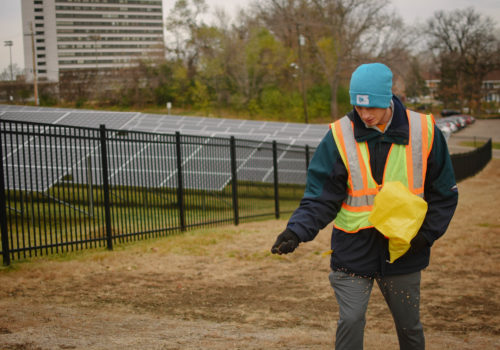 Planting pollinator seed mix at a solar array.