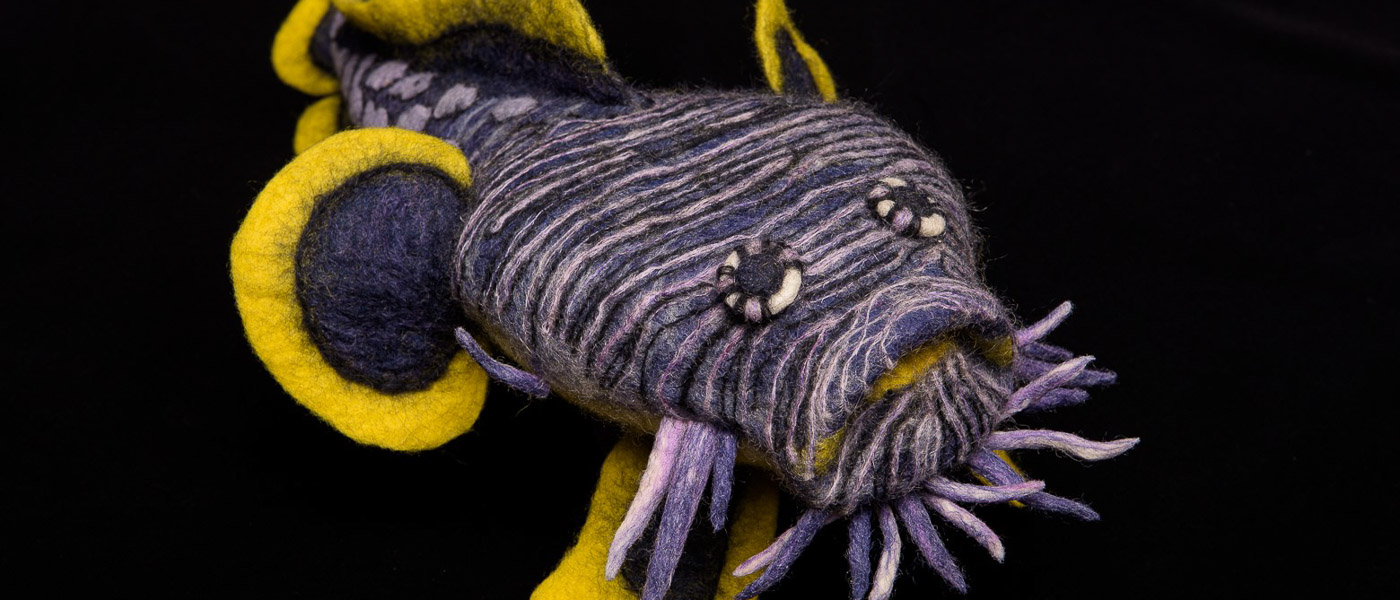 A felted wool fish.