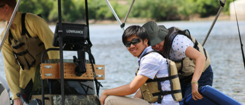 An MWMO intern assisting with water quality monitoring activities.