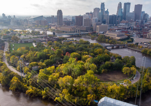 An aerial view of Nicollet Island and the downtown Minneapolis skyline.