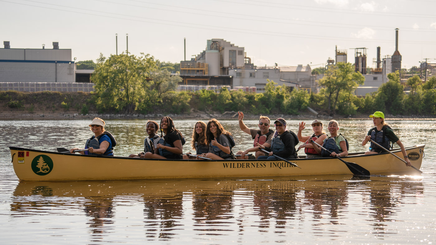 A canoe full of paddlers at Share the River Nordeast 2022.
